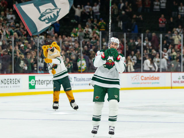SAINT PAUL, MN - NOVEMBER 19: Minnesota Wild defenseman Alex Goligoski (33) wins first star of the game during the NHL game between the Carolina Hurricanes and the Minnesota Wild, on November 19th, 2022, at Xcel Energy Center in Saint Paul, MN.