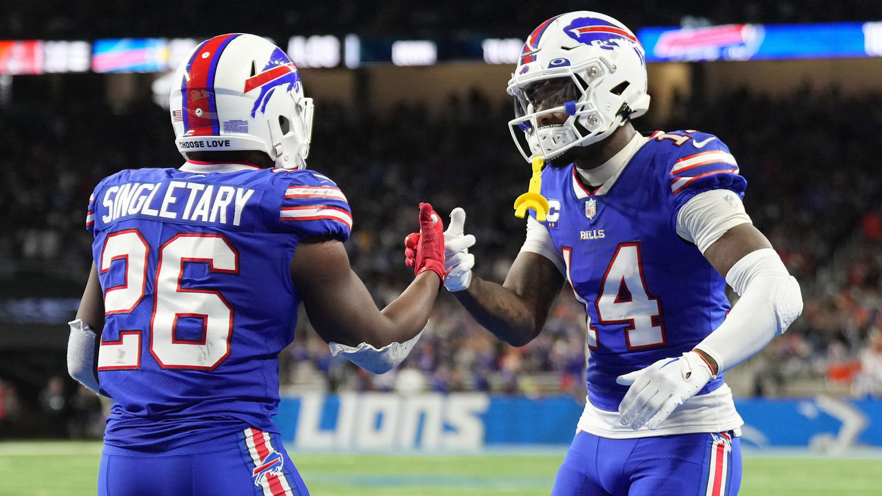 DETROIT, MICHIGAN - NOVEMBER 20: Devin Singletary #26 of the Buffalo Bills celebrates with Stefon Diggs #14 of the Buffalo Bills after Singletary's touchdown during the third quarter against the Cleveland Browns at Ford Field on November 20, 2022 in Detroit, Michigan.
