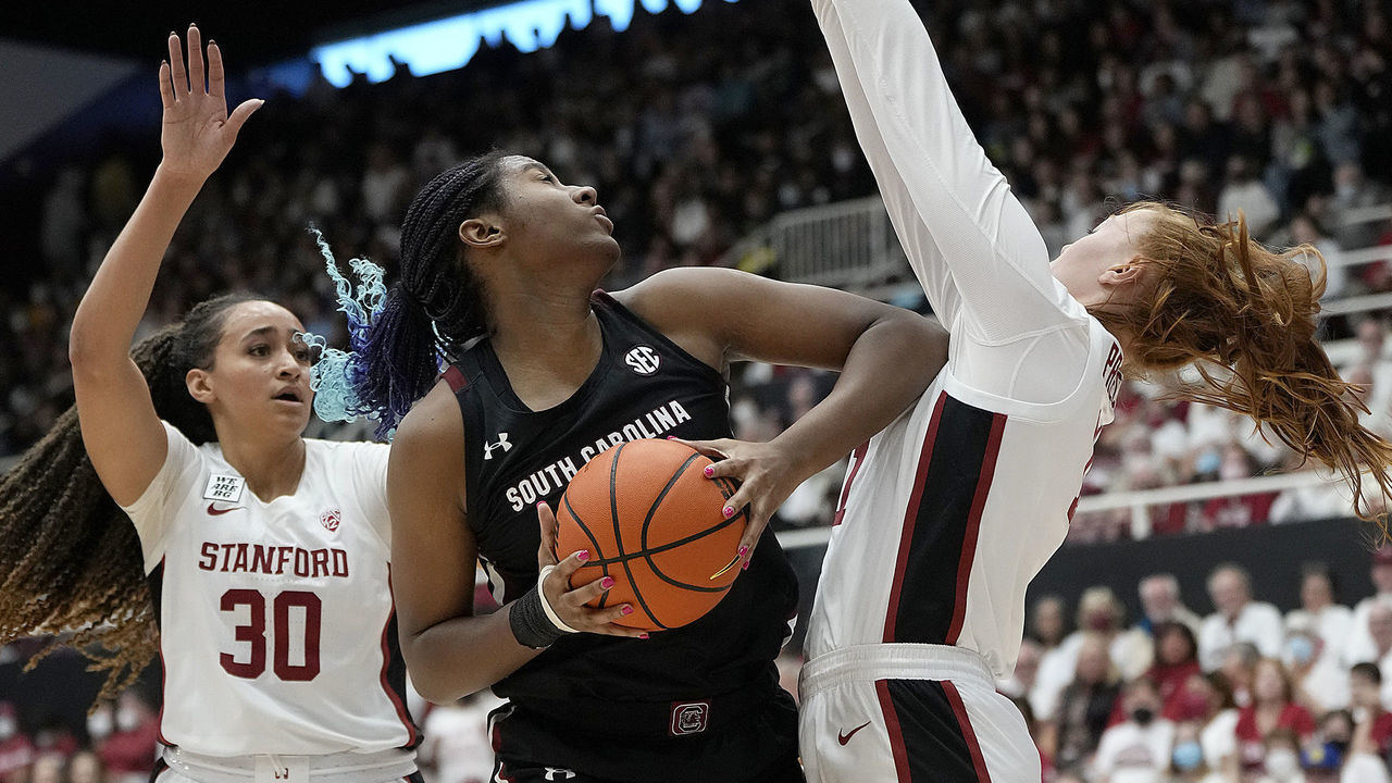 PALO ALTO, CALIFORNIA - NOVEMBER 20: Aliyah Boston #4 of the South Carolina Gamecocks commits an offensive foul on Ashten Prechtel #11 of the Stanford Cardinal during the first quarter at Stanford Maples Pavilion on November 20, 2022 in Palo Alto, California.