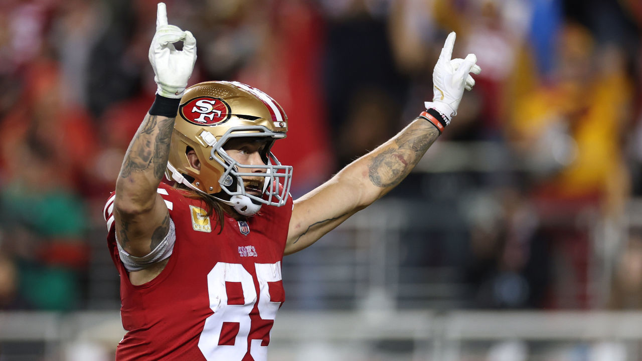 SANTA CLARA, CALIFORNIA - NOVEMBER 13: George Kittle #85 of the San Francisco 49ers celebrates after a touchdown by Christian McCaffrey #23 during the fourth quarter against the Los Angeles Chargers at Levi's Stadium on November 13, 2022 in Santa Clara, California.