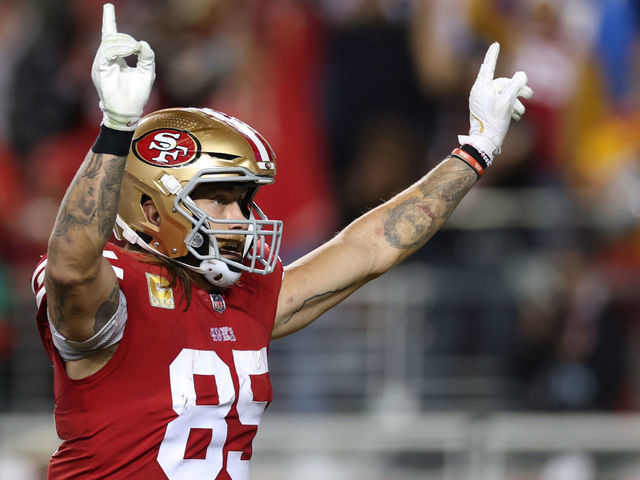 SANTA CLARA, CALIFORNIA - NOVEMBER 13: George Kittle #85 of the San Francisco 49ers celebrates after a touchdown by Christian McCaffrey #23 during the fourth quarter against the Los Angeles Chargers at Levi's Stadium on November 13, 2022 in Santa Clara, California.