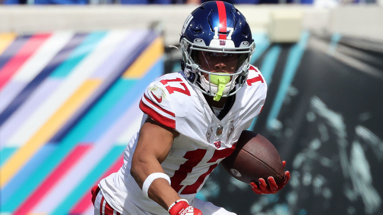 JACKSONVILLE, FLORIDA - OCTOBER 23: Wan'Dale Robinson #17 of the New York Giants runs the ball in the third quarter against the Jacksonville Jaguars at TIAA Bank Field on October 23, 2022 in Jacksonville, Florida.