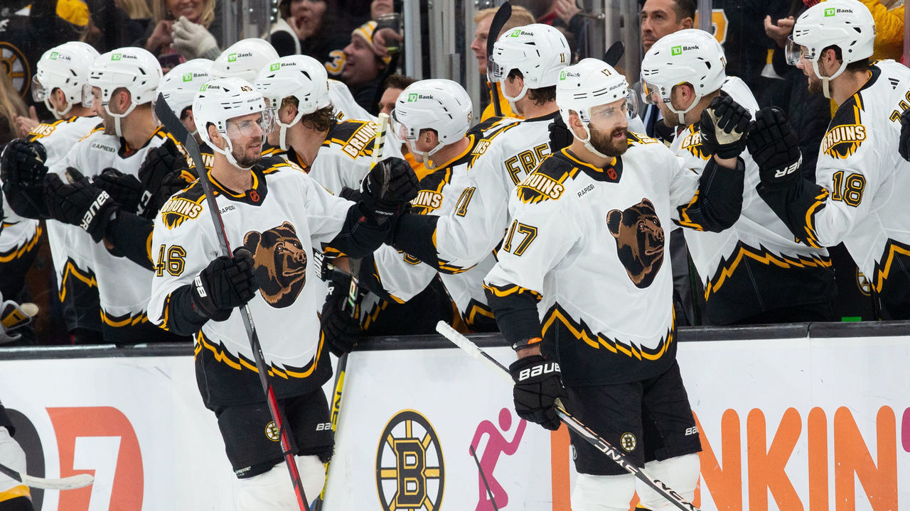 BOSTON, MA - NOVEMBER 19: David Krejci #46 of the Boston Bruins celebrates his goal against the Chicago Blackhawks with his teammates Nick Foligno #17 and A.J. Greer #10 during the second period at the TD Garden on November 19, 2022 in Boston, Massachusetts.