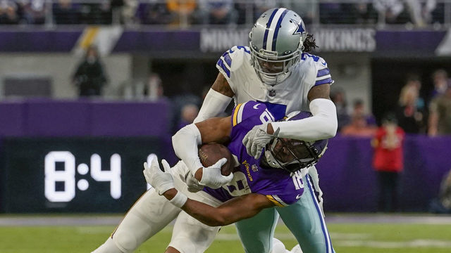 MINNEAPOLIS, MN - NOVEMBER 20: Dallas Cowboys cornerback Trevon Diggs (7) tackles Minnesota Vikings wide receiver Justin Jefferson (18) during a game between the Minnesota Vikings and Dallas Cowboys on November 20, 2022, at U.S. Bank Stadium in Minneapolis, MN.