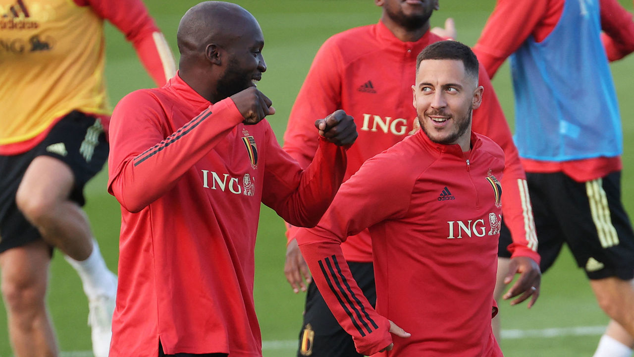 Belgium's forward Romelu Lukaku (L) chats with Belgium's forward Eden Hazard during a training session in Tubize on October 5, 2021 in preparations of their UEFA Nations League semifinal football match against France. - - Belgium OUT