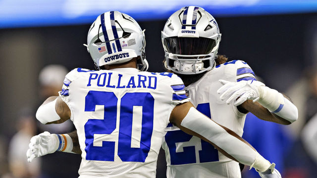 ARLINGTON, TEXAS - OCTOBER 2: Tony Pollard #20 and Ezekiel Elliott #21 of the Dallas Cowboys hug before a game against the Washington Commanders at AT&T Stadium on October 2, 2022 in Arlington, Texas. The Cowboys defeated the Commanders 25-10.