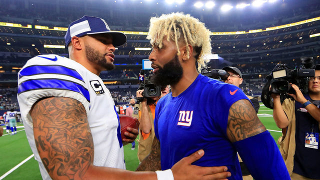 ARLINGTON, TX - SEPTEMBER 16: Dak Prescott #4 of the Dallas Cowboys greets Odell Beckham Jr. #13 of the New York Giants after the Dallas Cowboys beat the New York Giants 20-13 at AT&T Stadium on September 16, 2018 in Arlington, Texas.