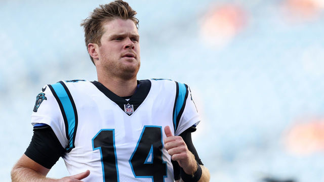 FOXBOROUGH, MASSACHUSETTS - AUGUST 19: Sam Darnold #14 of the Carolina Panthers warms up before the preseason game between the New England Patriots and the Carolina Panthers at Gillette Stadium on August 19, 2022 in Foxborough, Massachusetts.