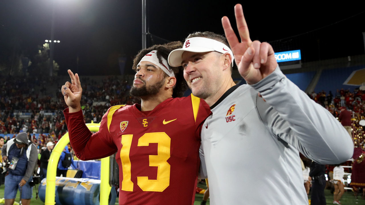 PASADENA, CA - NOVEMBER 19: USC Trojans quarterback Caleb Williams (13) and head coach Lincoln Riley (right) celebrate a victory against the UCLA Bruins after a college football game between the UCLA Bruins and the USC Trojans on November 19, 2022, at the Rose Bowl in Pasadena, CA.