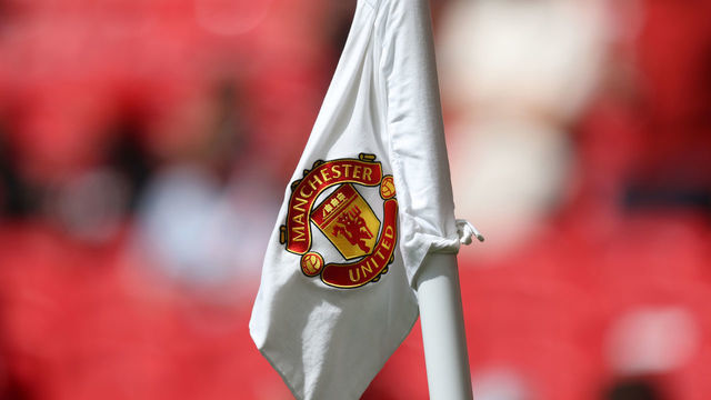 MANCHESTER, ENGLAND - AUGUST 07: Detailed view of a corner flag with the Manchester United badge on ahead of the Premier League match between Manchester United and Brighton & Hove Albion at Old Trafford on August 07, 2022 in Manchester, England.