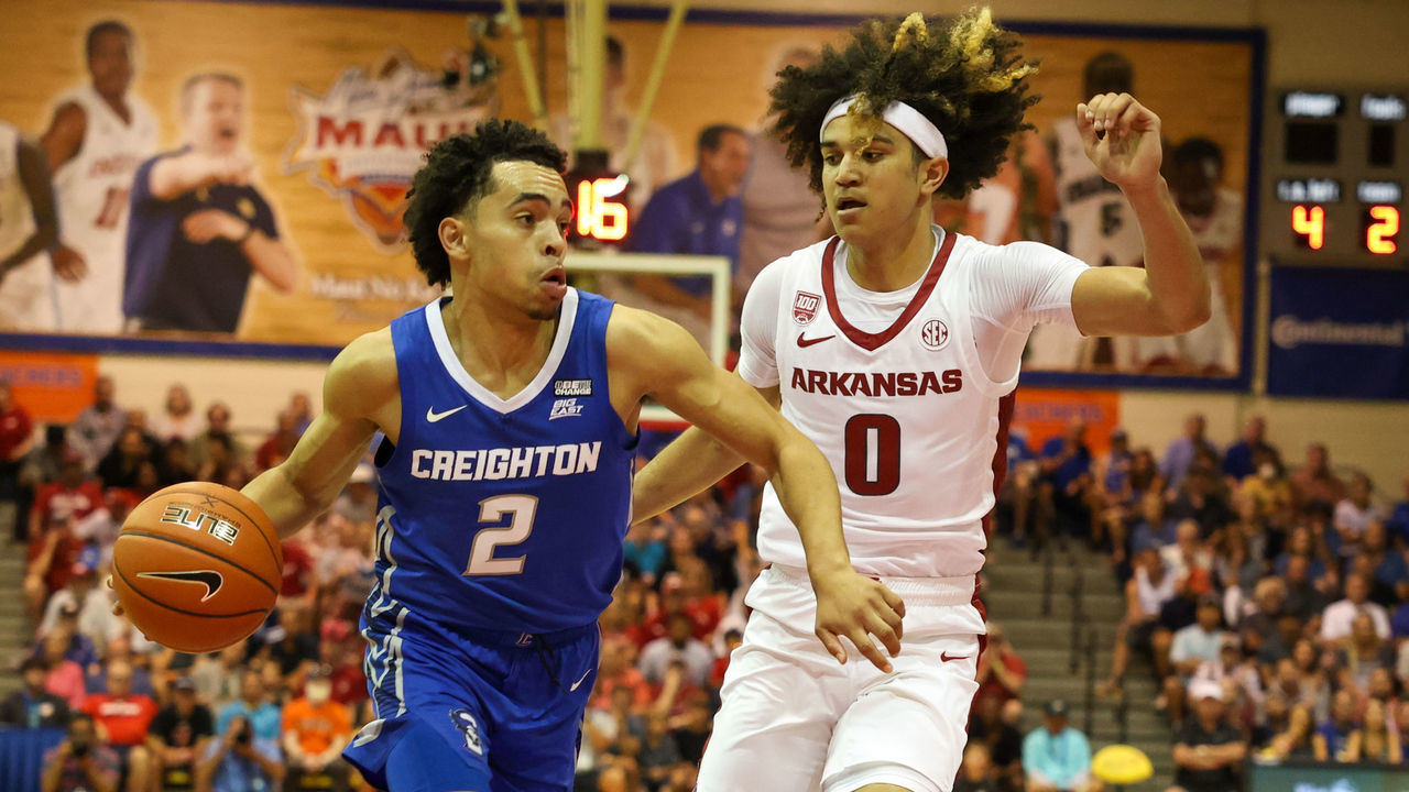 LAHAINA, HI - NOVEMBER 22: Ryan Nembhard #2 of the Creighton Bluejays drives the lane ahead of Anthony Black #0 of the Arkansas Razorbacks in the first half of the game during the Maui Invitational at Lahaina Civic Center on November 22, 2022 in Lahaina, Hawaii.