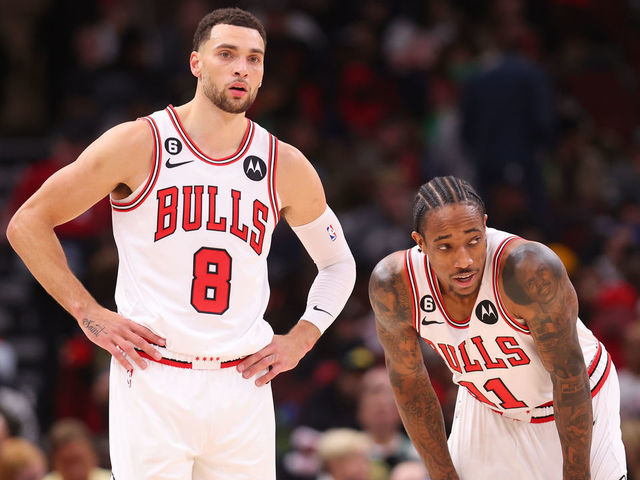 CHICAGO, ILLINOIS - NOVEMBER 21: Zach LaVine #8 and DeMar DeRozan #11 of the Chicago Bulls look on against the Boston Celtics during the second half at United Center on November 21, 2022 in Chicago, Illinois.