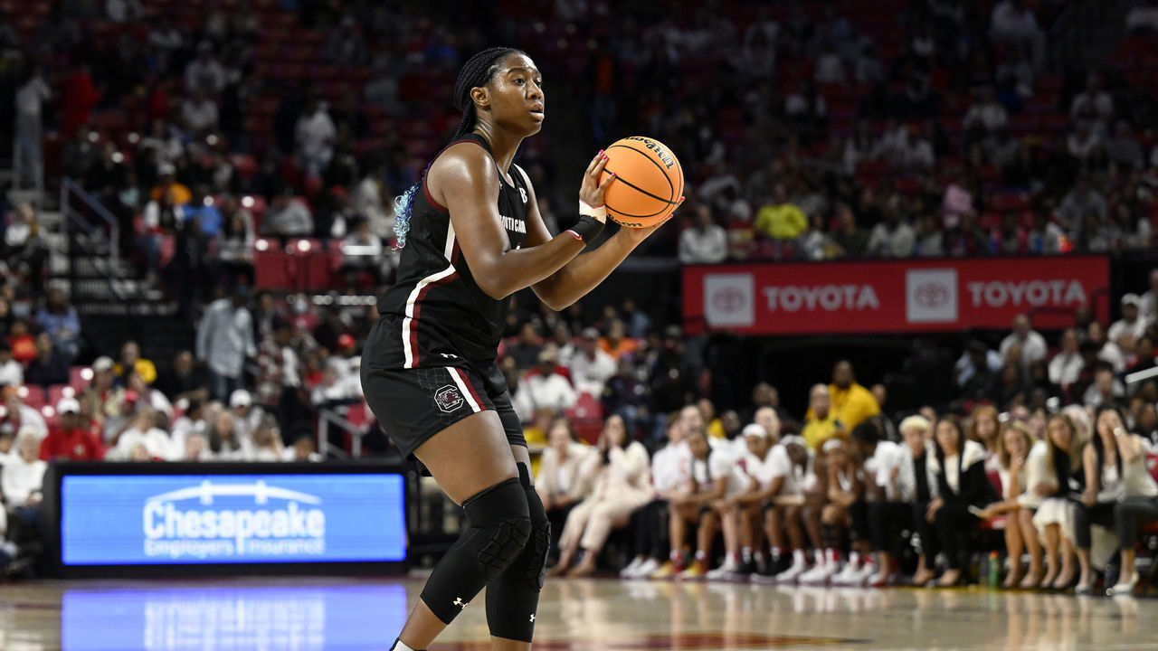COLLEGE PARK, MARYLAND - NOVEMBER 11: Aliyah Boston #4 of the South Carolina Gamecocks handles the ball against the Maryland Terrapins at Xfinity Center on November 11, 2022 in College Park, Maryland.