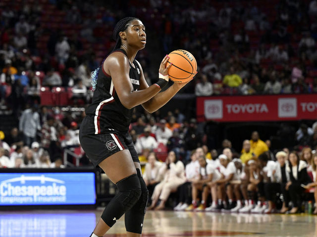 COLLEGE PARK, MARYLAND - NOVEMBER 11: Aliyah Boston #4 of the South Carolina Gamecocks handles the ball against the Maryland Terrapins at Xfinity Center on November 11, 2022 in College Park, Maryland.