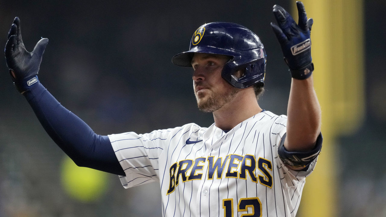 MILWAUKEE, WISCONSIN - OCTOBER 01: Hunter Renfroe #12 of the Milwaukee Brewers celebrates after hitting a single against the Miami Marlins in the sixth inning at American Family Field on October 01, 2022 in Milwaukee, Wisconsin.