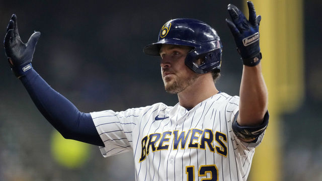MILWAUKEE, WISCONSIN - OCTOBER 01: Hunter Renfroe #12 of the Milwaukee Brewers celebrates after hitting a single against the Miami Marlins in the sixth inning at American Family Field on October 01, 2022 in Milwaukee, Wisconsin.