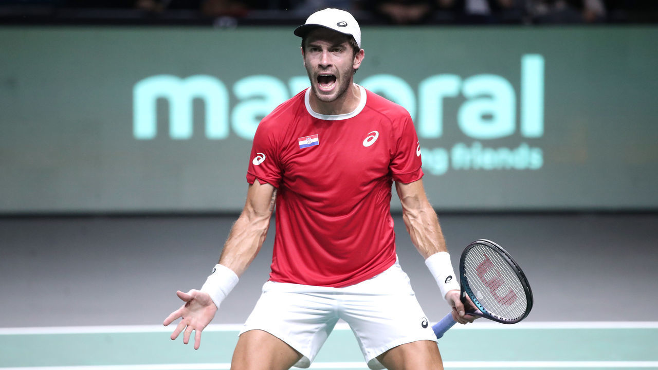 MALAGA, SPAIN - NOVEMBER 23: Borna Coric of Croatia celebrates his win over Roberto Bautista of Spain during the Davis Cup by Rakuten Finals 2022 match between Croatia and Spain at Palacio de los Deportes Jose Maria Martin Carpena on November 23, 2022 in Malaga, Spain. (Photo by Sanjin Strukic/Pixsell/MB Media/Getty Images