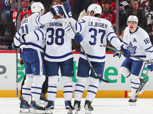 NEWARK, NJ - NOVEMBER 23: John Tavares #91 of the Toronto Maple Leafs celebrates his goal with teammates during the first period of the game against the New Jersey Devils on November 23, 2022 at the Prudential Center in Newark, New Jersey.