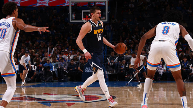 OKLAHOMA CITY, OK - NOVEMBER 23: Nikola Jokic #15 of the Denver Nuggets passes the ball during the game against the Oklahoma City Thunder on November 23, 2022 at Paycom Arena in Oklahoma City, Oklahoma. Mandatory Copyright Notice: Copyright 2022 NBAE