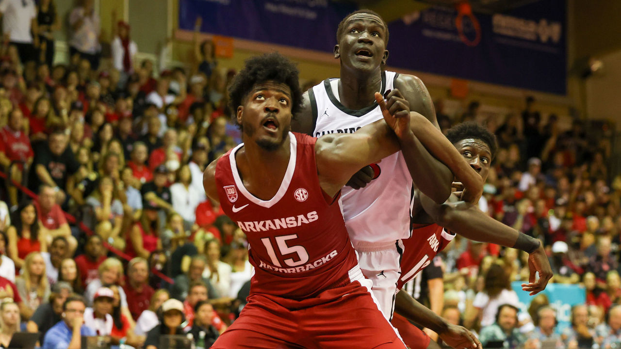 LAHAINA, HI - NOVEMBER 23: Makhi Mitchell #15 of the Arkansas Razorbacks and Aguek Arop #33 of the San Diego State Aztecs fight for position under the basket during a free throw attempt in the first half of the game during the Maui Invitational at Lahaina Civic Center on November 23, 2022 in Lahaina, Hawaii.