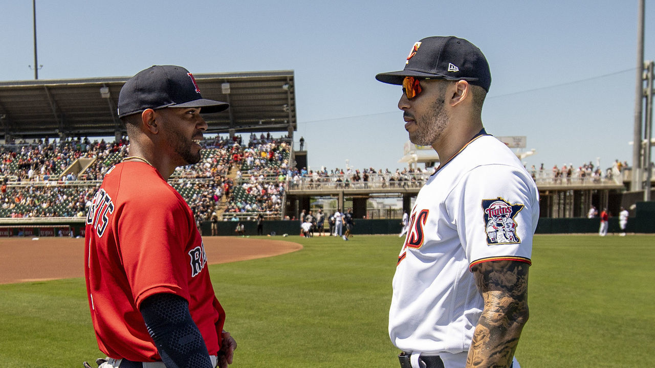 FT. MYERS, FL - MARCH 27: Xander Bogaerts #2 of the Boston Red Sox greets Carlos Correa #4 of the Minnesota Twins before a Grapefruit League game on March 27, 2022 at CenturyLink Sports Complex in Fort Myers, Florida.