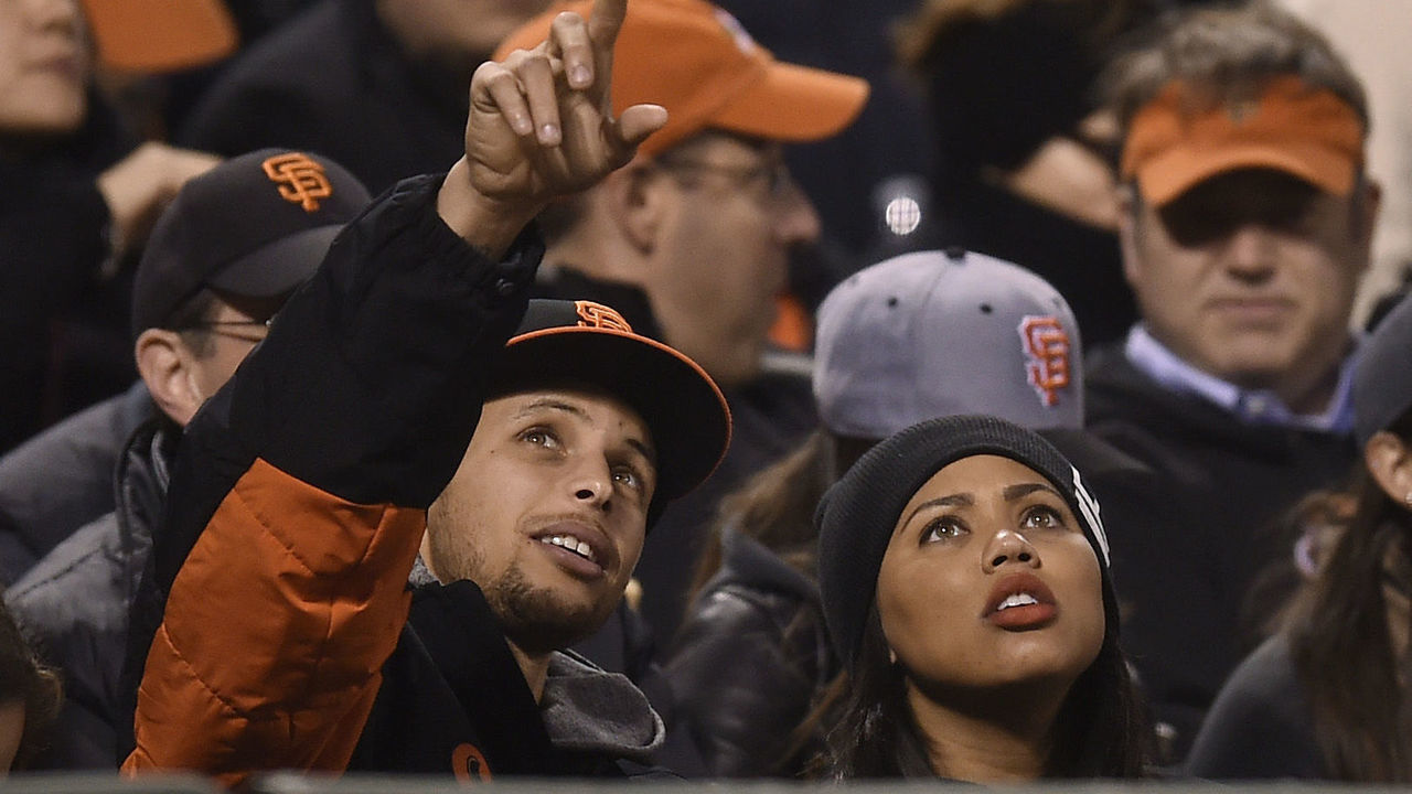 Golden State Warriors' Stephen Curry and his wife Ayesha Curry attend the San Francisco Giants vs. Atlanta Braves game at AT&T Park in San Francisco, Calif., on Friday, May 29, 2015. (Jose Carlos Fajardo/Bay Area News Group)