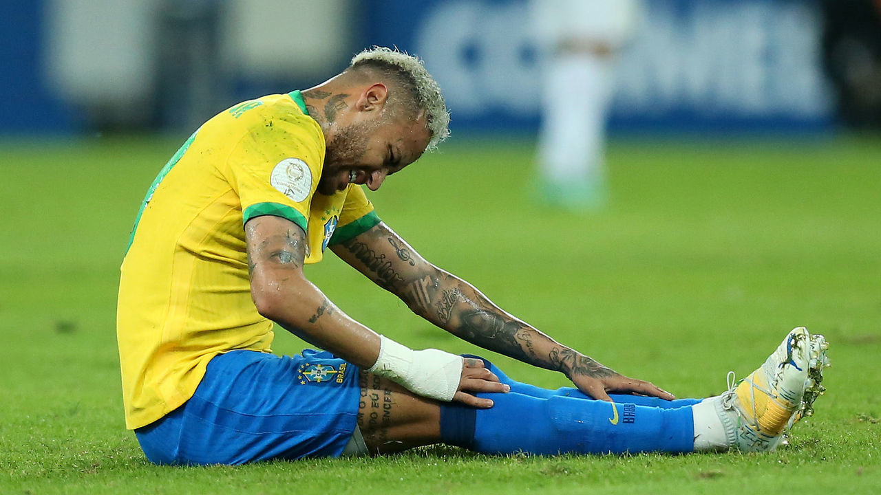 RIO DE JANEIRO, BRAZIL - JULY 10: Neymar Jr. of Brazil reacts after suffering an injury during the final of Copa America Brazil 2021 between Brazil and Argentina at Maracana Stadium on July 10, 2021 in Rio de Janeiro, Brazil.