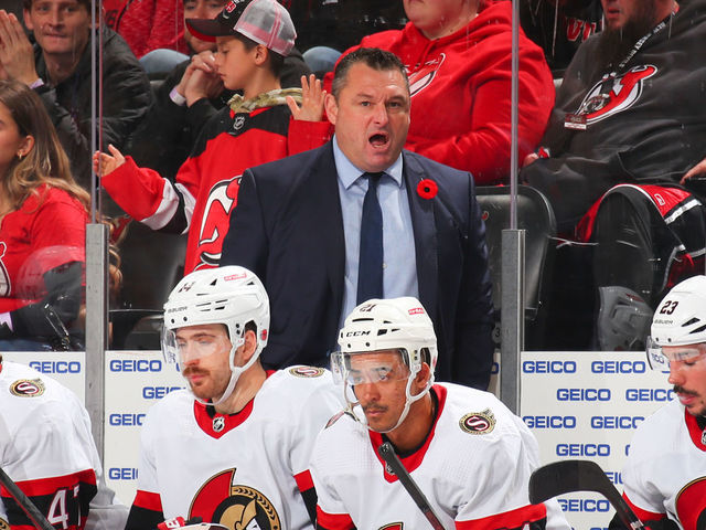 NEWARK, NJ - NOVEMBER 10: D.J. Smith Ottawa Senators head coach behind the bench against the New Jersey Devils on November 10, 2022 at the Prudential Center in Newark, New Jersey.