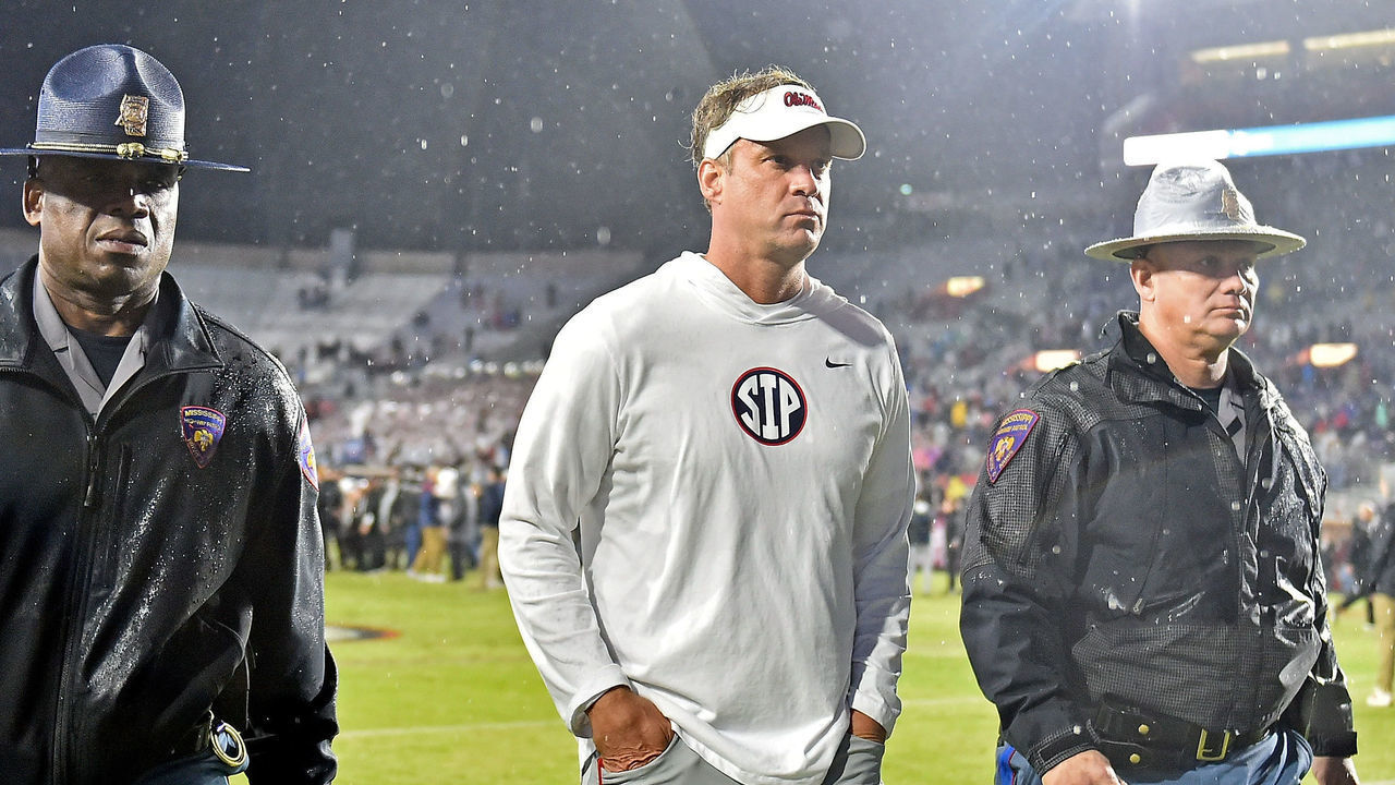 OXFORD, MISSISSIPPI - NOVEMBER 24: Head coach Lane Kiffin of the Mississippi Rebels looks on after the game against the Mississippi State Bulldogs at Vaught-Hemingway Stadium on November 24, 2022 in Oxford, Mississippi.