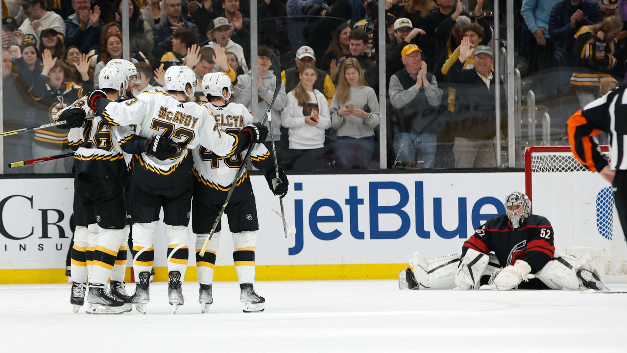 BOSTON, MA - NOVEMBER 25: David Krejci #46 of the Boston Bruins celebrates his goal with his teammates Charlie McAvoy #73, Pavel Zacha #18 and Matt Grzelcyk #48 against the Carolina Hurricanes during the second period at the TD Garden on November 25, 2022 in Boston, Massachusetts.