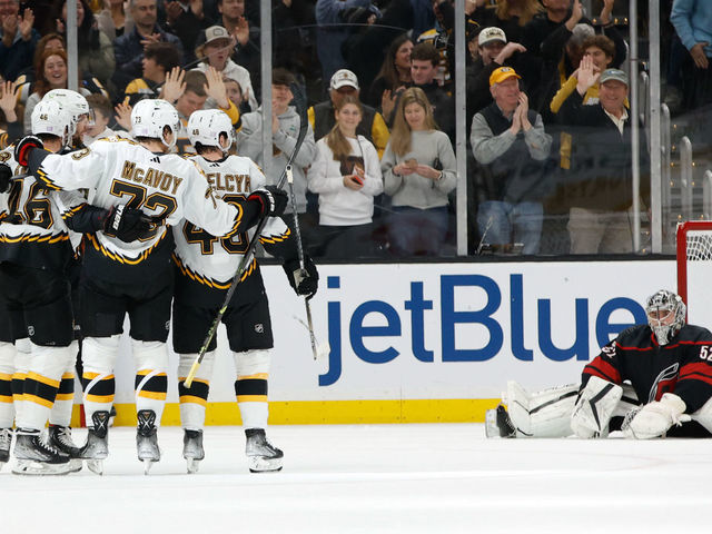 BOSTON, MA - NOVEMBER 25: David Krejci #46 of the Boston Bruins celebrates his goal with his teammates Charlie McAvoy #73, Pavel Zacha #18 and Matt Grzelcyk #48 against the Carolina Hurricanes during the second period at the TD Garden on November 25, 2022 in Boston, Massachusetts.