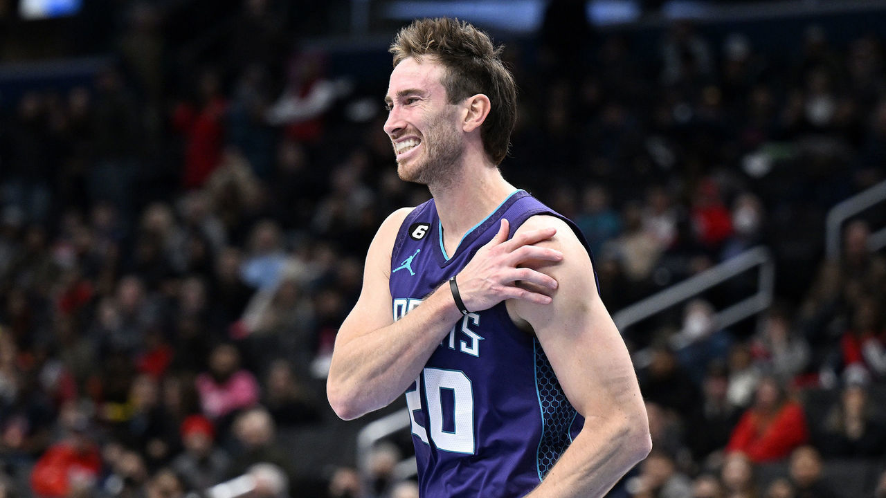WASHINGTON, DC - NOVEMBER 20: Gordon Hayward #20 of the Charlotte Hornets holds his shoulder after dunking the ball in the fourth quarter against the Washington Wizards at Capital One Arena on November 20, 2022 in Washington, DC.