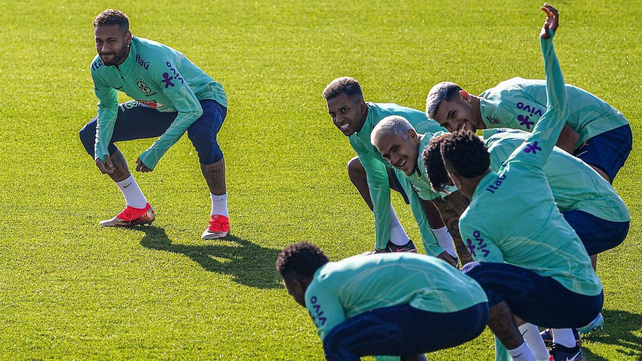 (From L) Brazil's forward Neymar, Brazil's forward Rodrygo, Brazil's forward Pedro and Brazil's midfielder Bruno Guimaraes stretch during a training session on November 18, 2022 at the Continassa training ground in Turin, as part of Brazil's preparation ahead of the Qatar 2022 World Cup.