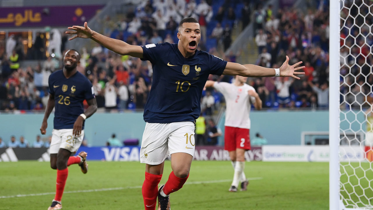 DOHA, QATAR - NOVEMBER 26: Kylian Mbappe of France celebrates after scoring their team's second goal during the FIFA World Cup Qatar 2022 Group D match between France and Denmark at Stadium 974 on November 26, 2022 in Doha, Qatar.