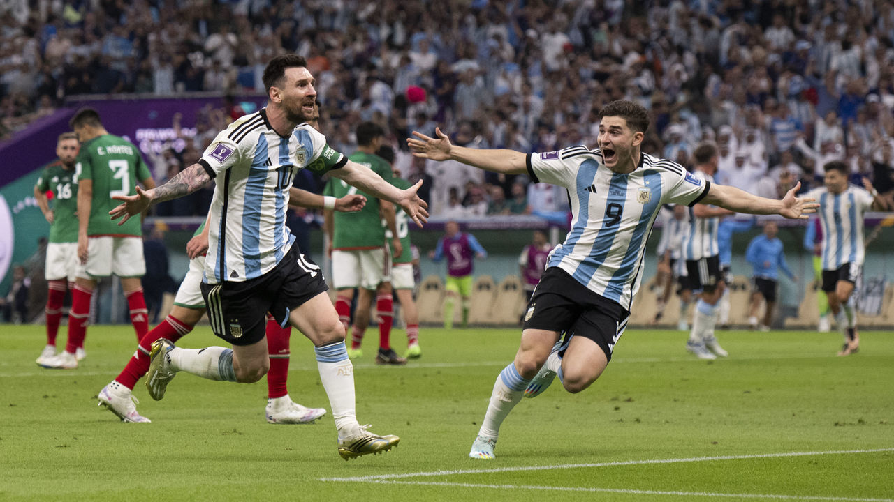 LUSAIL CITY, QATAR - NOVEMBER 26: Lionel Messi of Argentina celebrates after scoring the first goal of his team during the FIFA World Cup Qatar 2022 Group C match between Argentina and Mexico at Lusail Stadium on November 26, 2022 in Lusail City, Qatar.