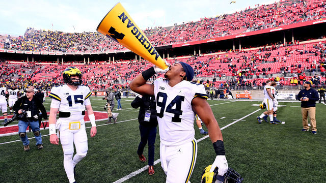 COLUMBUS, OHIO - NOVEMBER 26: Kris Jenkins #94 of the Michigan Wolverines celebrates a 45-23 victory over the Ohio State Buckeyes at Ohio Stadium on November 26, 2022 in Columbus, Ohio.