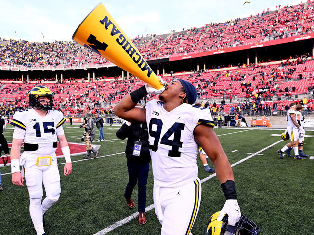 COLUMBUS, OHIO - NOVEMBER 26: Kris Jenkins #94 of the Michigan Wolverines celebrates a 45-23 victory over the Ohio State Buckeyes at Ohio Stadium on November 26, 2022 in Columbus, Ohio.