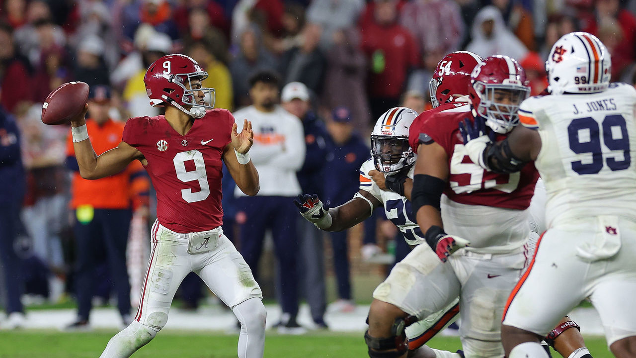 TUSCALOOSA, ALABAMA - NOVEMBER 26: Bryce Young #9 of the Alabama Crimson Tide looks to pass against the Auburn Tigers during the second half at Bryant-Denny Stadium on November 26, 2022 in Tuscaloosa, Alabama.