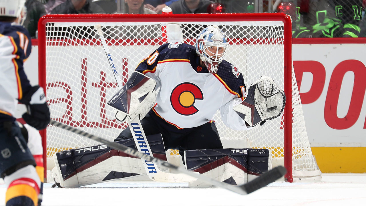 DENVER, COLORADO - NOVEMBER 26: Goaltender Alexander Georgiev #40 of the Colorado Avalanche makes a glove save against the Dallas Stars at Ball Arena on November 26, 2022 in Denver, Colorado.