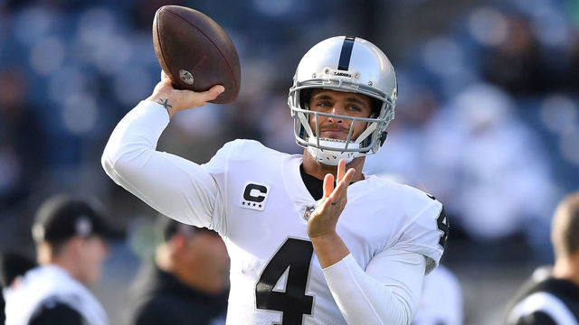SEATTLE, WASHINGTON - NOVEMBER 27: Derek Carr #4 of the Las Vegas Raiders warms up prior to the game against the Seattle Seahawks at Lumen Field on November 27, 2022 in Seattle, Washington.