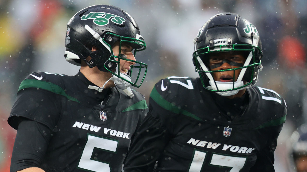 EAST RUTHERFORD, NEW JERSEY - NOVEMBER 27: Mike White #5 of the New York Jets and Garrett Wilson #17 of the New York Jets celebrate after a touchdown in the second half of a game against the Chicago Bears at MetLife Stadium on November 27, 2022 in East Rutherford, New Jersey.