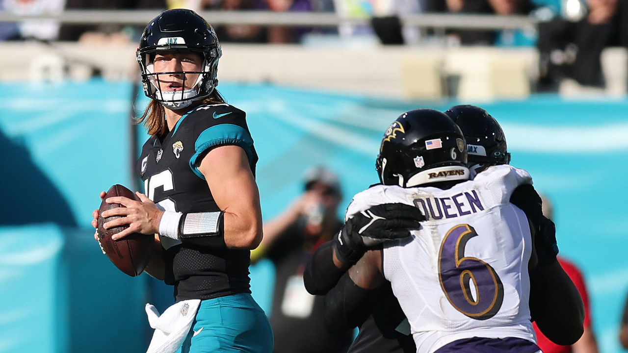 JACKSONVILLE, FLORIDA - NOVEMBER 27: Trevor Lawrence #16 of the Jacksonville Jaguars looks to pass during the second half in the game against the Baltimore Ravens at TIAA Bank Field on November 27, 2022 in Jacksonville, Florida.