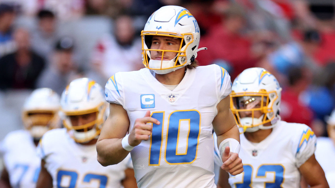 GLENDALE, ARIZONA - NOVEMBER 27: Justin Herbert #10 of the Los Angeles Chargers takes to the field prior to a game Arizona Cardinals at State Farm Stadium on November 27, 2022 in Glendale, Arizona.
