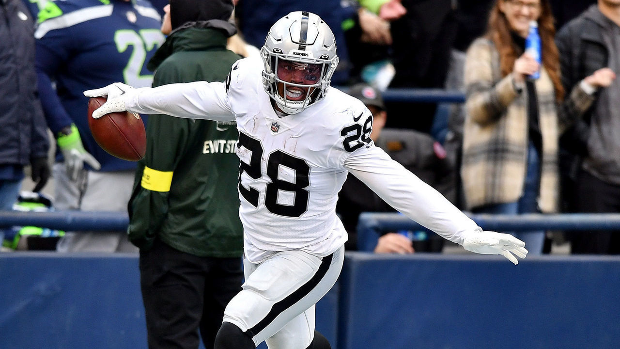 SEATTLE, WASHINGTON - NOVEMBER 27: Josh Jacobs #28 of the Las Vegas Raiders celebrates a touchdown during the first half in the game against the Seattle Seahawks at Lumen Field on November 27, 2022 in Seattle, Washington.