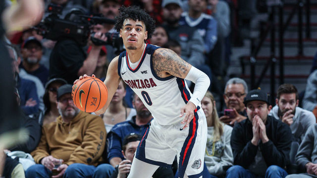 PORTLAND, OR - NOVEMBER 25: Julian Strawther #0 of the Gonzaga Bulldogs brings the ball up court during the game against the Purdue Boilermakers at Moda Center on November 25, 2022 in Portland, Oregon.