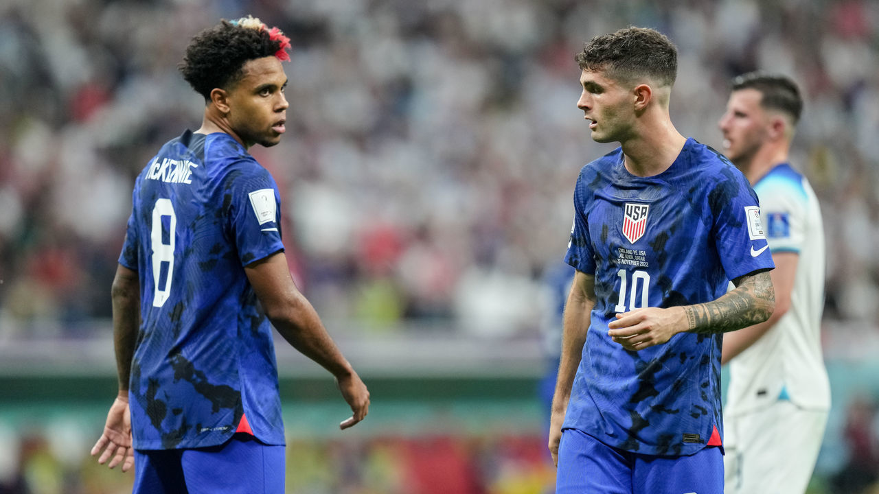 AL KHOR, QATAR - NOVEMBER 25: Weston McKennie of USA and Christian Pulisic of USA talk to each other during the FIFA World Cup Qatar 2022 Group B match between England and USA at Al Bayt Stadium on November 25, 2022 in Al Khor, Qatar.
