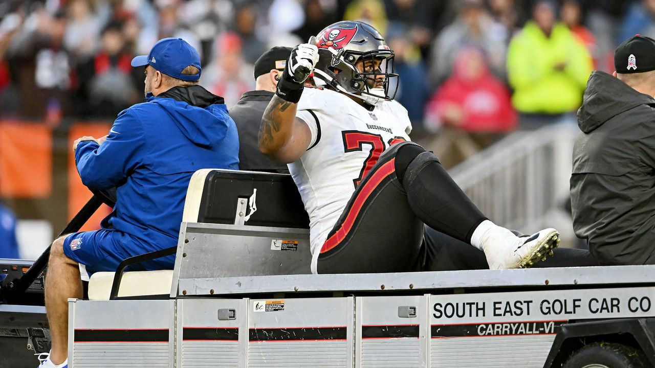 CLEVELAND, OHIO - NOVEMBER 27: Tristan Wirfs #78 of the Tampa Bay Buccaneers is carted off the field during overtime against the Cleveland Browns at FirstEnergy Stadium on November 27, 2022 in Cleveland, Ohio.