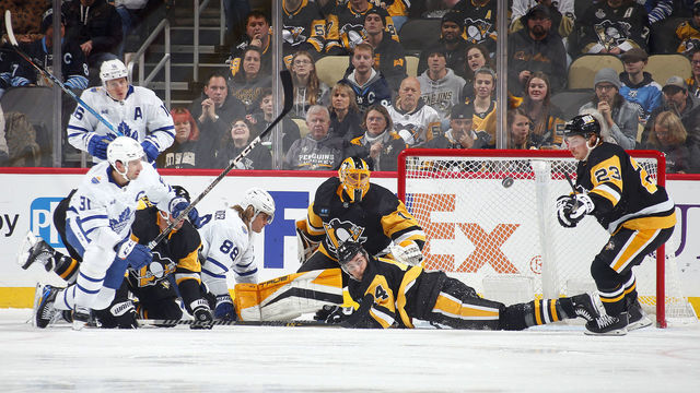 PITTSBURGH, PA - NOVEMBER 26: Casey DeSmith #1 of the Pittsburgh Penguins protects the net against the Toronto Maple Leafs during the game at PPG PAINTS Arena on November 26, 2022 in Pittsburgh, Pennsylvania.