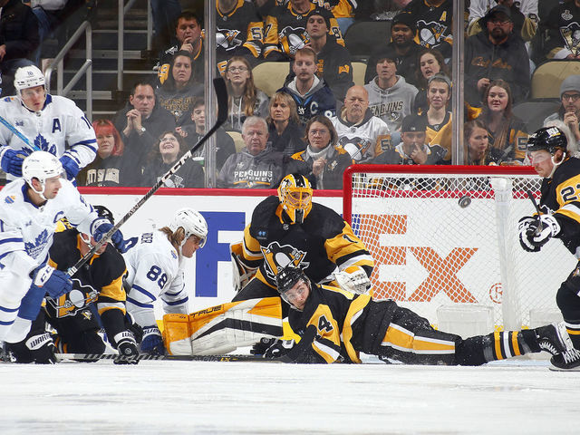 PITTSBURGH, PA - NOVEMBER 26: Casey DeSmith #1 of the Pittsburgh Penguins protects the net against the Toronto Maple Leafs during the game at PPG PAINTS Arena on November 26, 2022 in Pittsburgh, Pennsylvania.