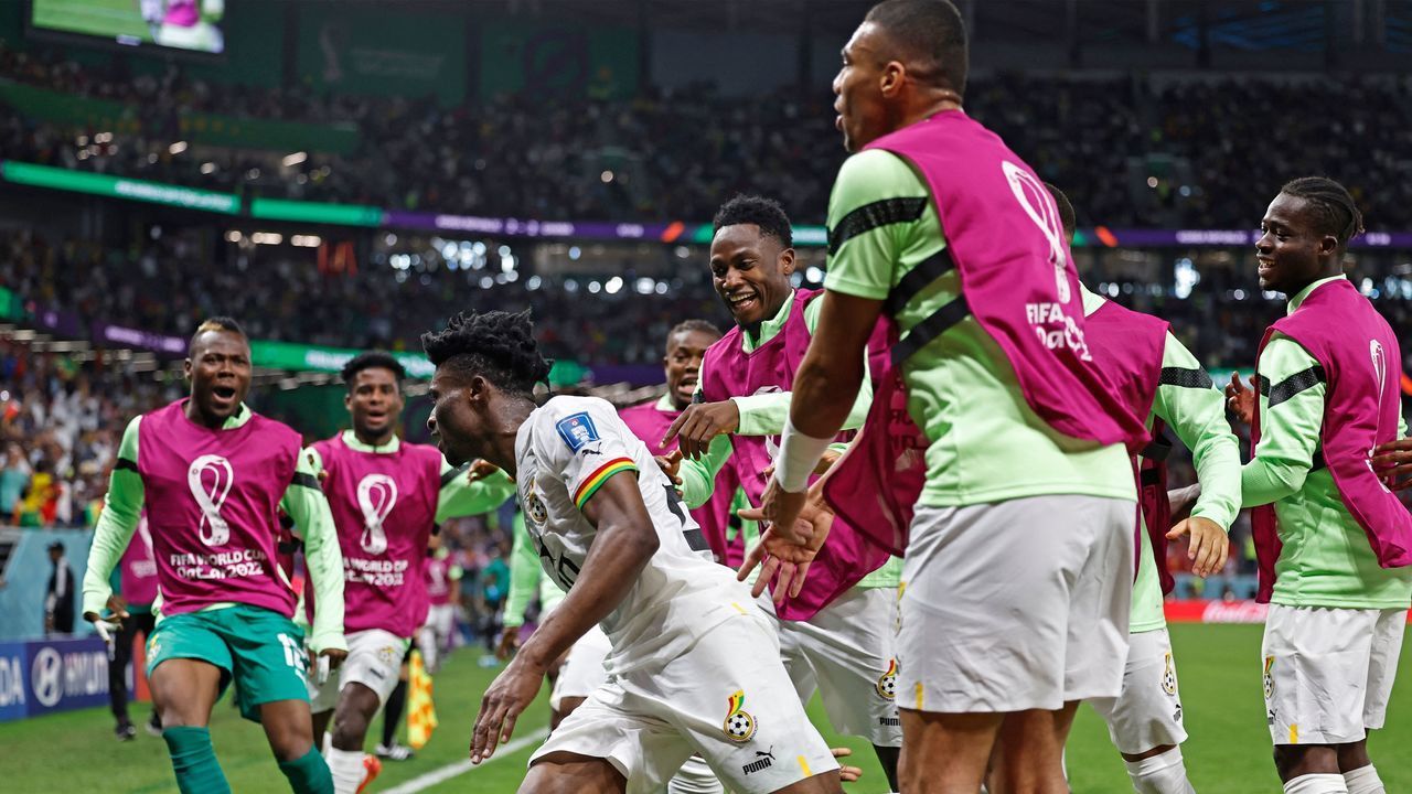 Ghana's midfielder #20 Mohammed Kudus (C) celebrates scoring his team's third goal with his teammates during the Qatar 2022 World Cup Group H football match between South Korea and Ghana at the Education City Stadium in Al-Rayyan, west of Doha, on November 28, 2022.